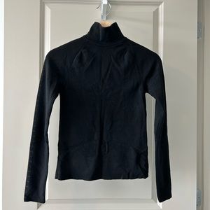 Balenciaga turtle neck wool top in black